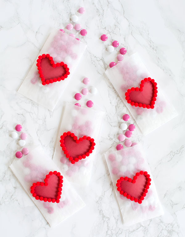 DIY-Valentines-Day-Heart-Pom-Pom-Treat-Bags1