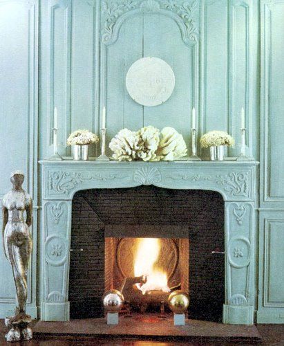 This stunning aqua fireplace is elegant and grand!