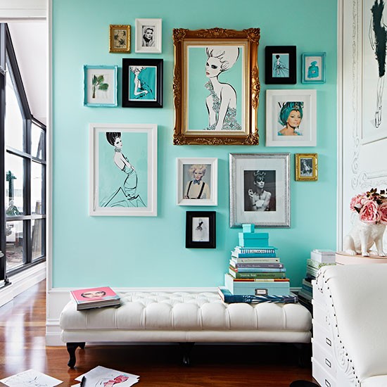 this tiffany blue wall decorated with stunning artwork is perfect for a modern girl