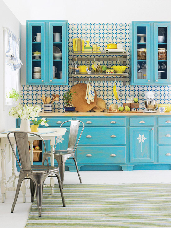 This gorgeous kitchen pairs aqua with yellow and white for a bright and fun style