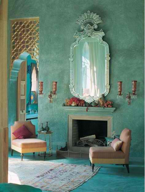 THis dramatic and stunning room has a gorgeous detailed aqua wall with accents of deep red and ogld