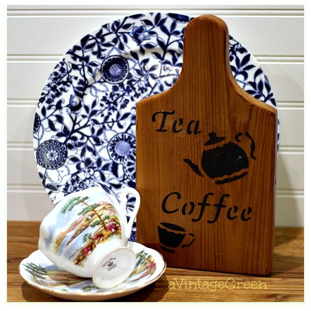 cup and saucer blue and white plate breadboard sign