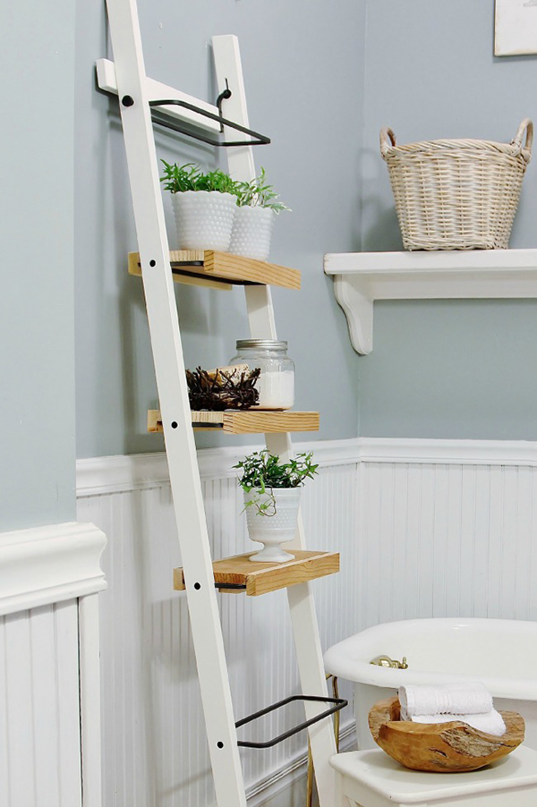 A simple towel holder turned into this cute bathroom decorative shelf