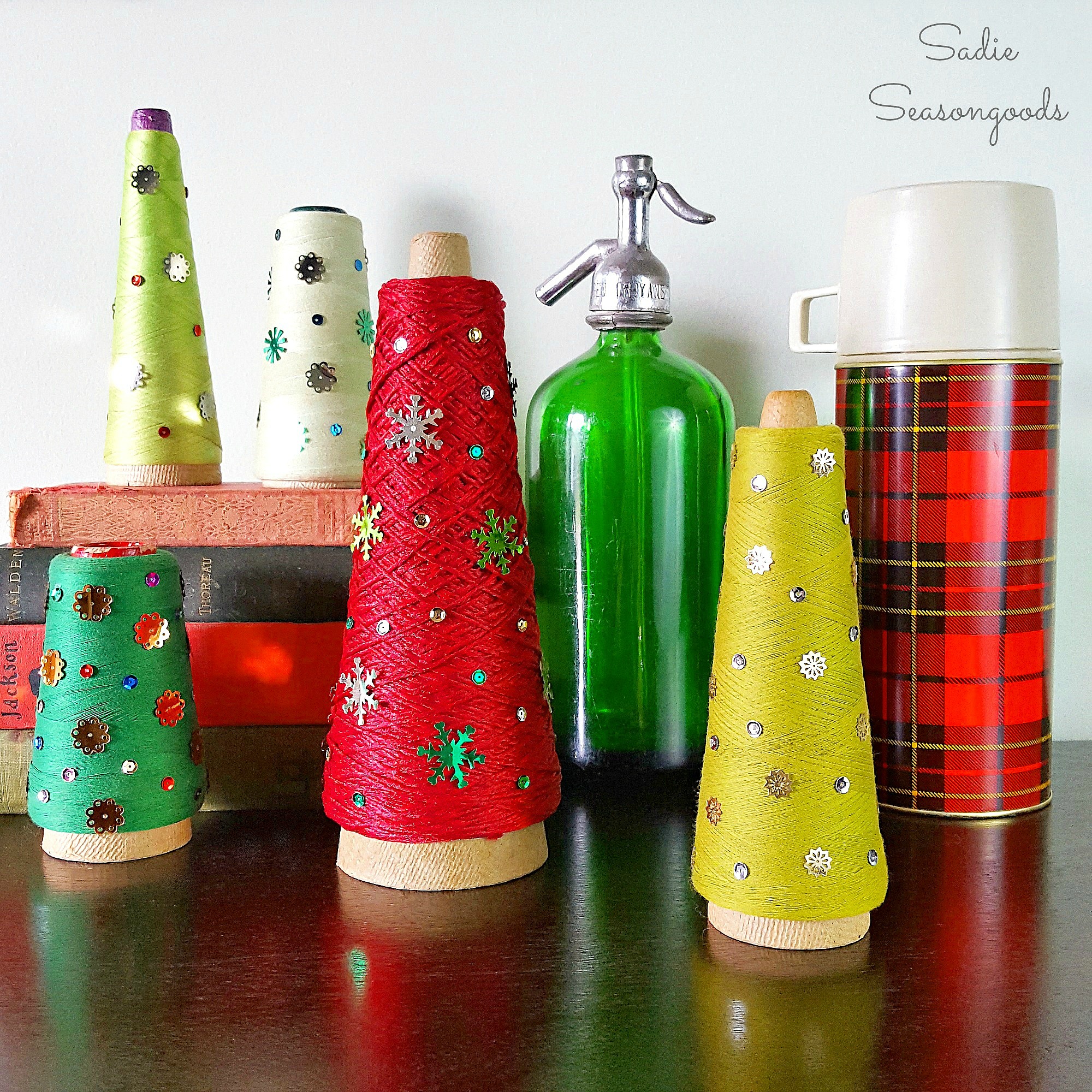 Vintage_serger_cone_thread_repurposed_and_upcycled_as_DIY_Christmas_trees_with_vintage_sequins_holiday_decor_by_Sadie_Seasongoods