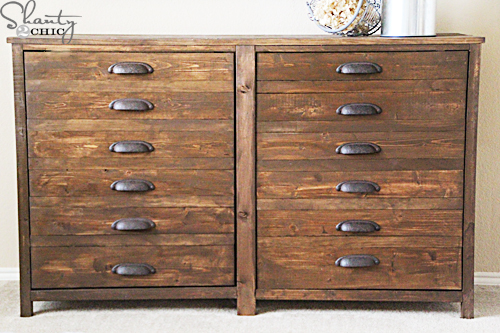 This refurbished wooden dresser has tons of storage and looks vintage. 