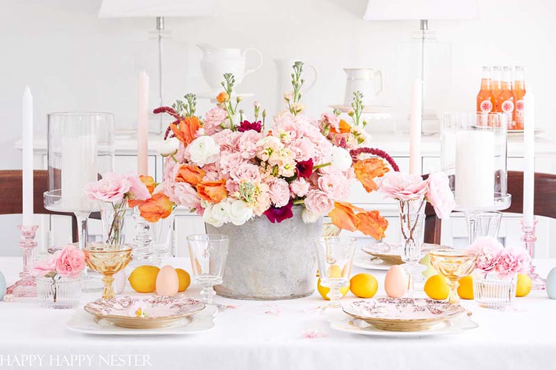 Adding a touch of Spring with Farmhouse Flower Ideas is a quick and easy way of adding charm, a pop of pretty and freshness to any room or space.