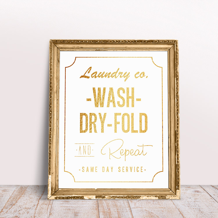 White background with gold text - free printable laundry room wall art