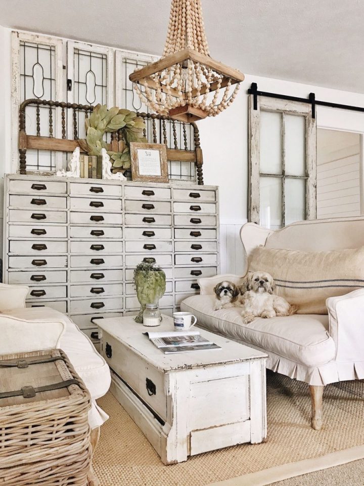 The white and rustic tones in this living room space compliment the vintage look.