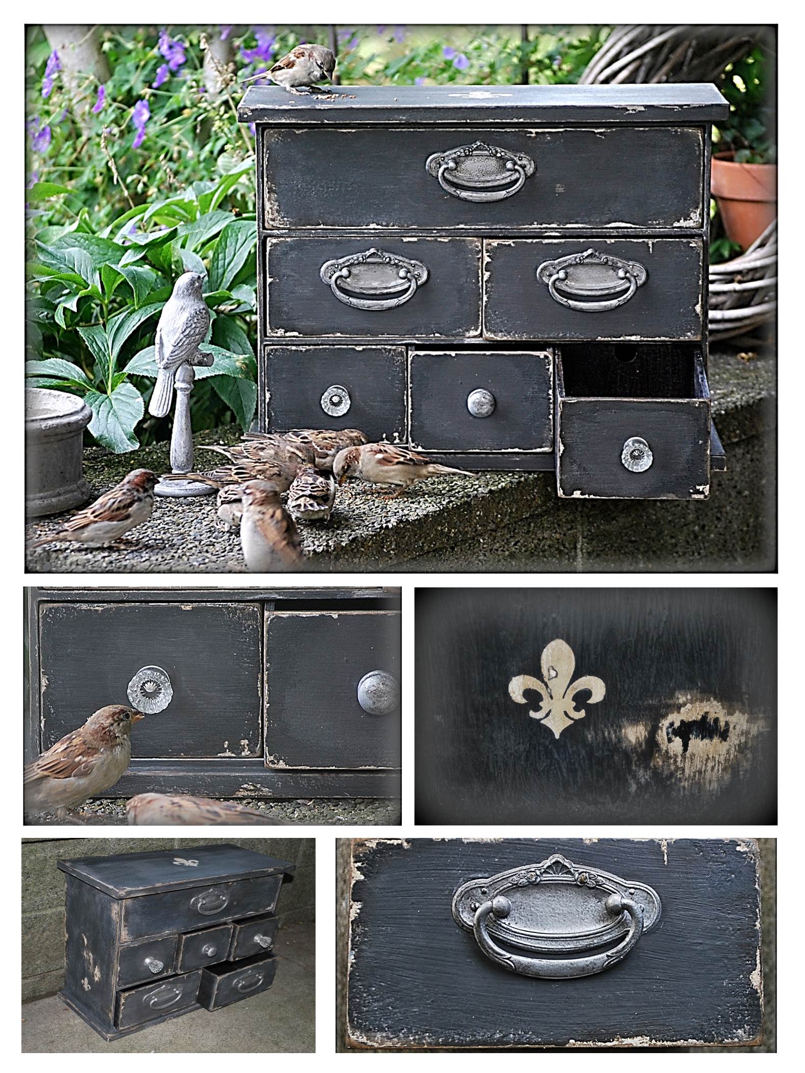 This rustic cabinet is painted with chalkboard paint and distressed for a wore, vintage look