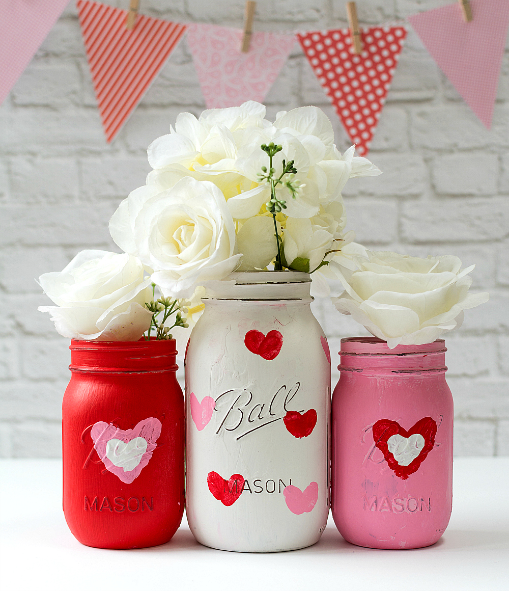 Nothing says Valentine’s Day Like some Valentine’s Day Mason Jar DIY Creations.  All of these cuties will tell someone how Loved they are. 