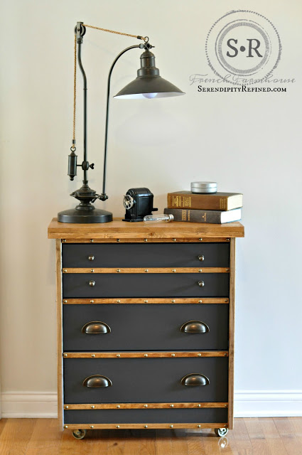 These vintage drawers work well with the wood accents, antique lamp, and books.