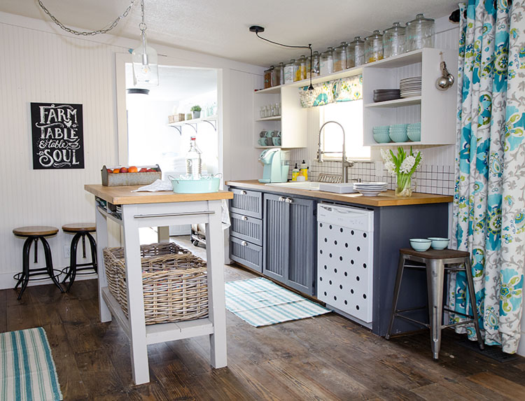 This farmhouse style kitchen is colorful and bright