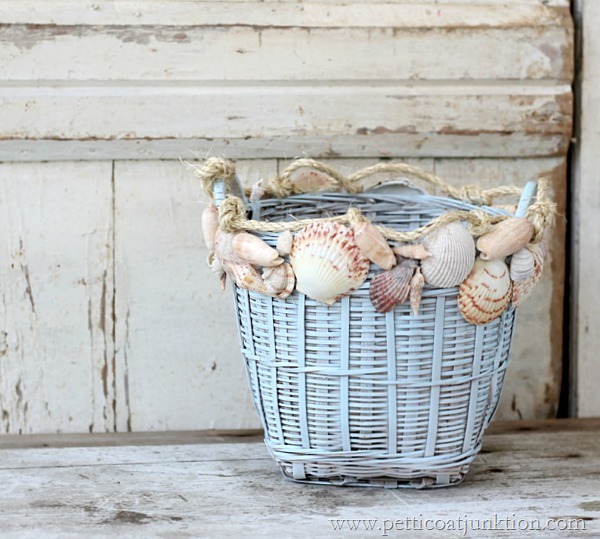 This DIY painted basket with seashells is coastal and beachy. 