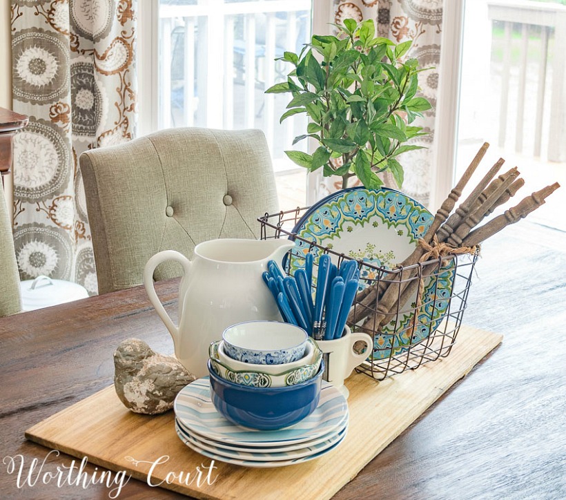 This simple centerpiece brings farmhouse home decor with a vintage touch - these dishes are stunning!
