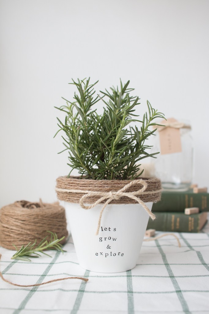 This adorable white flower pot with burlap string is perfect for herbs. 