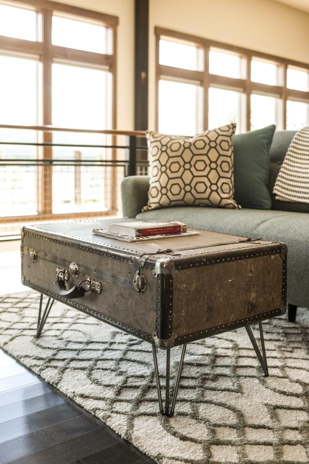 Add some legs to this vintage traveling chest and you've got a stunning industrial style coffee table