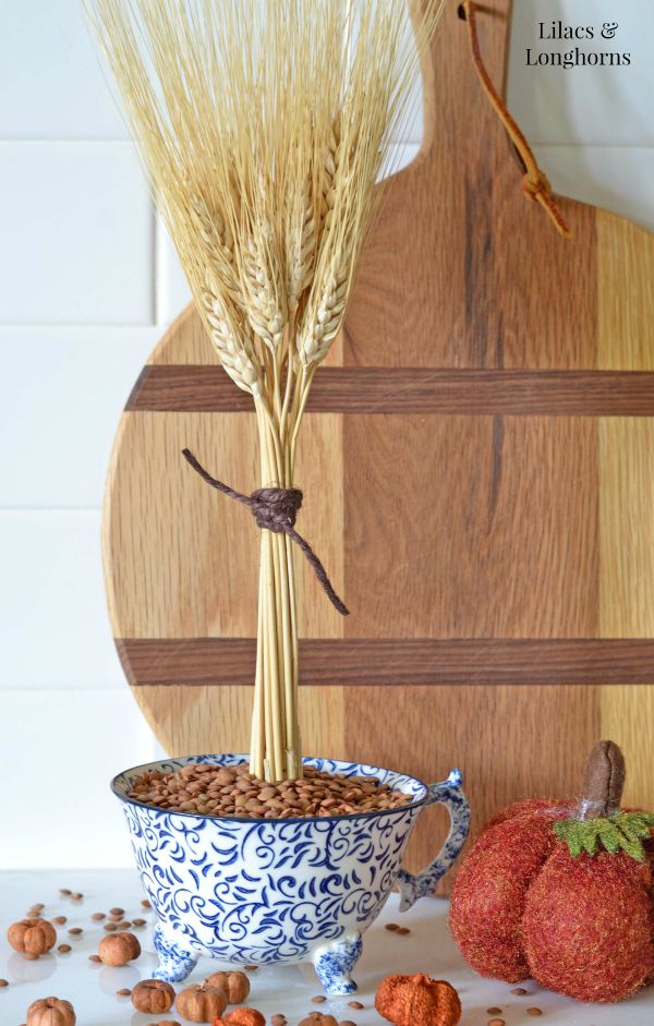 This DIY wheat teacup decor element is great for the fall season.