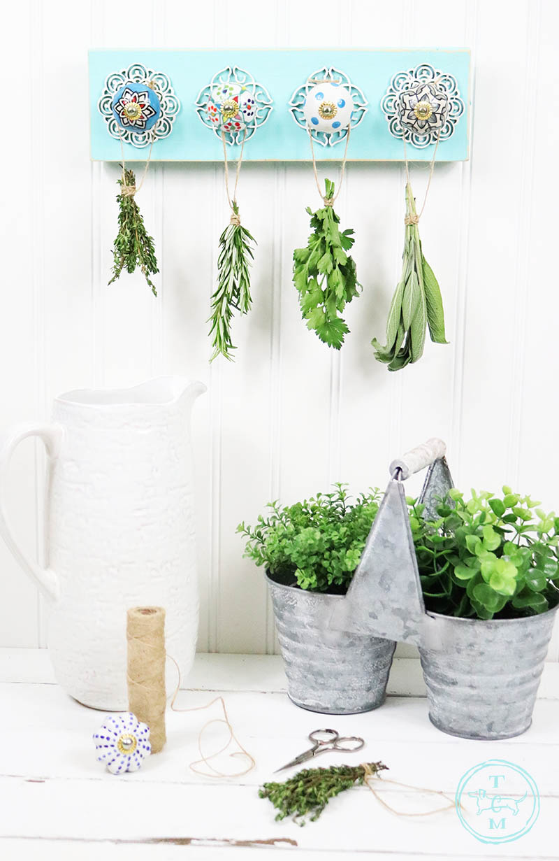 This DIY Herb Drying Rack is perfect for the Cook, Gardener or anyone that just loves Herbs in their daily cooking and loves a pretty new wall hanging for the Kitchen.