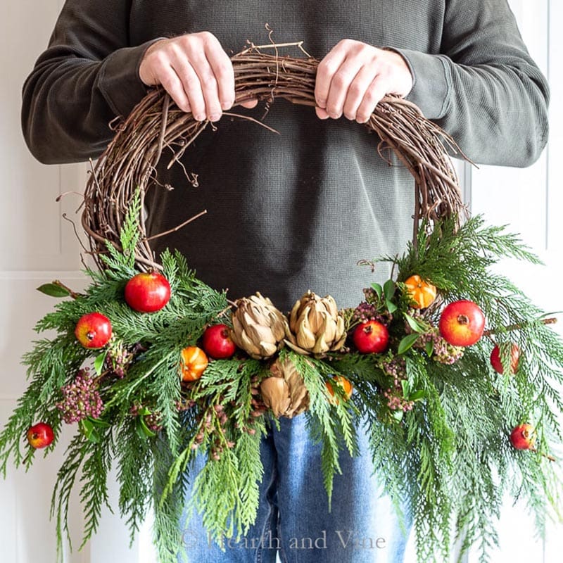 Let’s explore this fabulous Collection of Wonderful DIY Farmhouse Christmas Wreaths.  Each one is unique, beautiful and has tons of Farmhouse Charm. You might have a problem choosing.