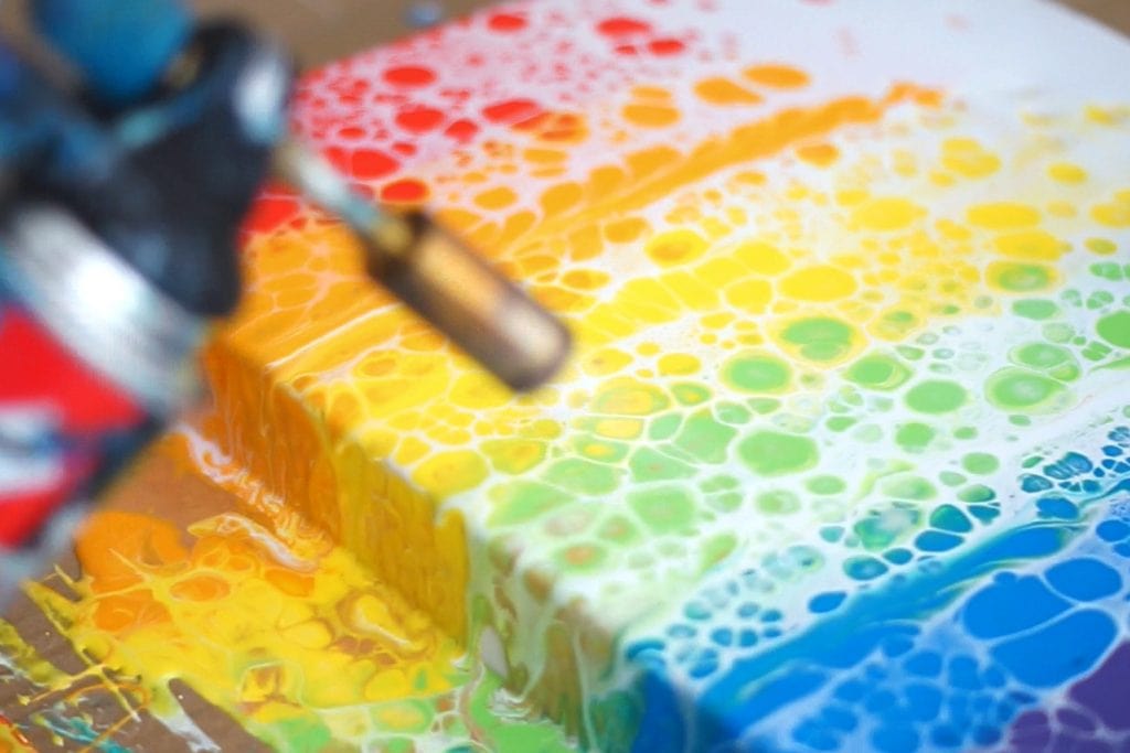 Looking for some artistic fun? Then I am sure you are going to love trying the Hot DIY Acrylic Paint Pour Art Trend!