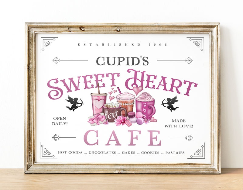 This Pretty Free Printable Valentine's Day Cafe Sign is going to add a touch of charm and a splash of  love to your space!