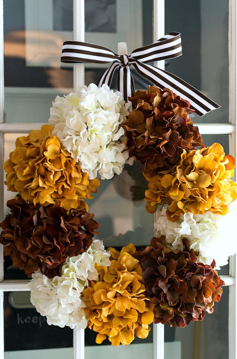 Transform your home with 50+ Farmhouse Fall Wreath DIY projects! Embrace the beauty of autumn with charming wreaths for every style.